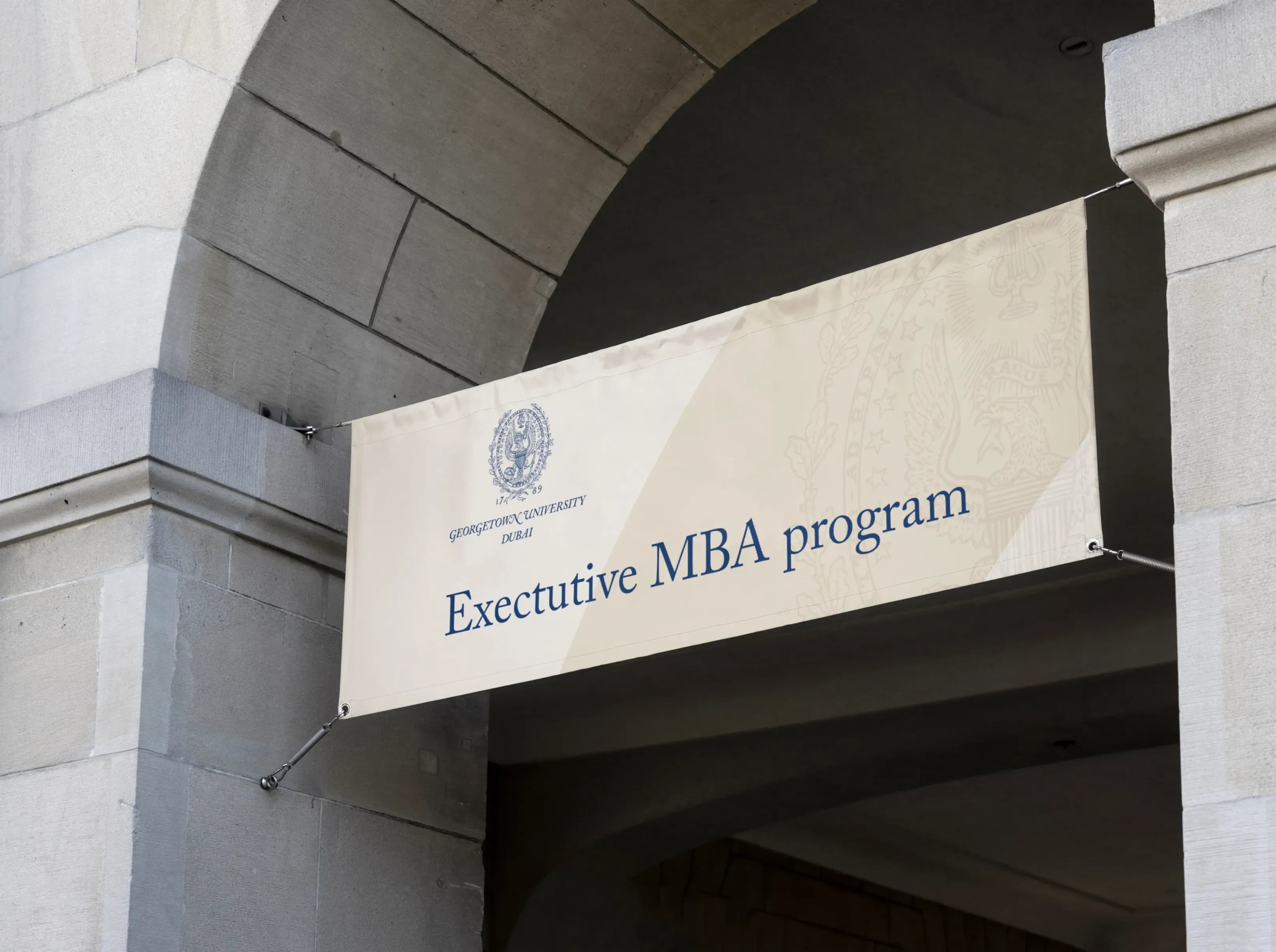 Banner for Georgetown University Dubai Executive MBA program. Skyne, a creative agency, specializes in branding and marketing for executive education programs in Dubai, Riyadh, and Jeddah.